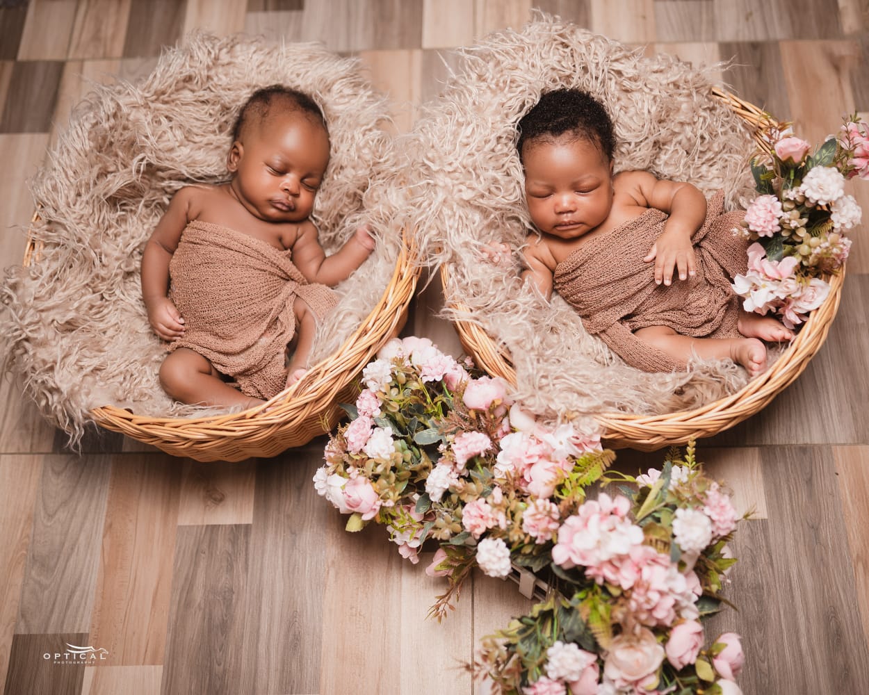IVF twins in professional studio baskets at Sali Women's Hospital Lusaka (privacy protected)